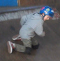 kid falling safely skateboarding