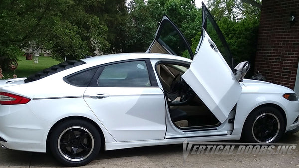 Check out Gregory's Ford Fusion from Michigan featuring Lambo Door Conversion Kit by Vertical Doors Inc.