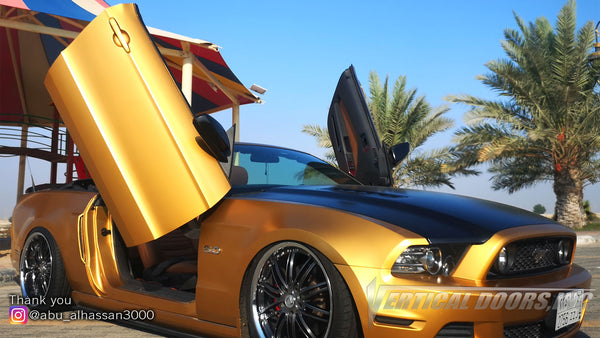 Check out Ali's 5th Gen Mustang GT convertible from Saudi Arabia featuring Vertical Doors, Inc., vertical lambo doors conversion kit.