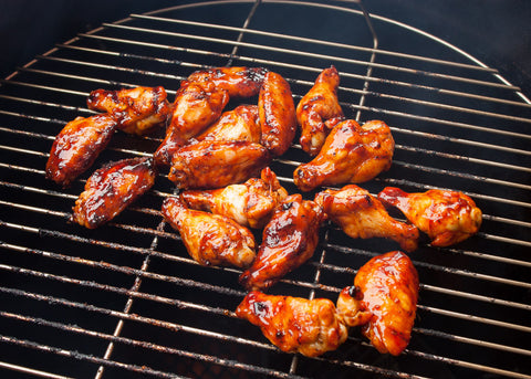 Loren Hill's bbq chicken wings cooking on the smoker.