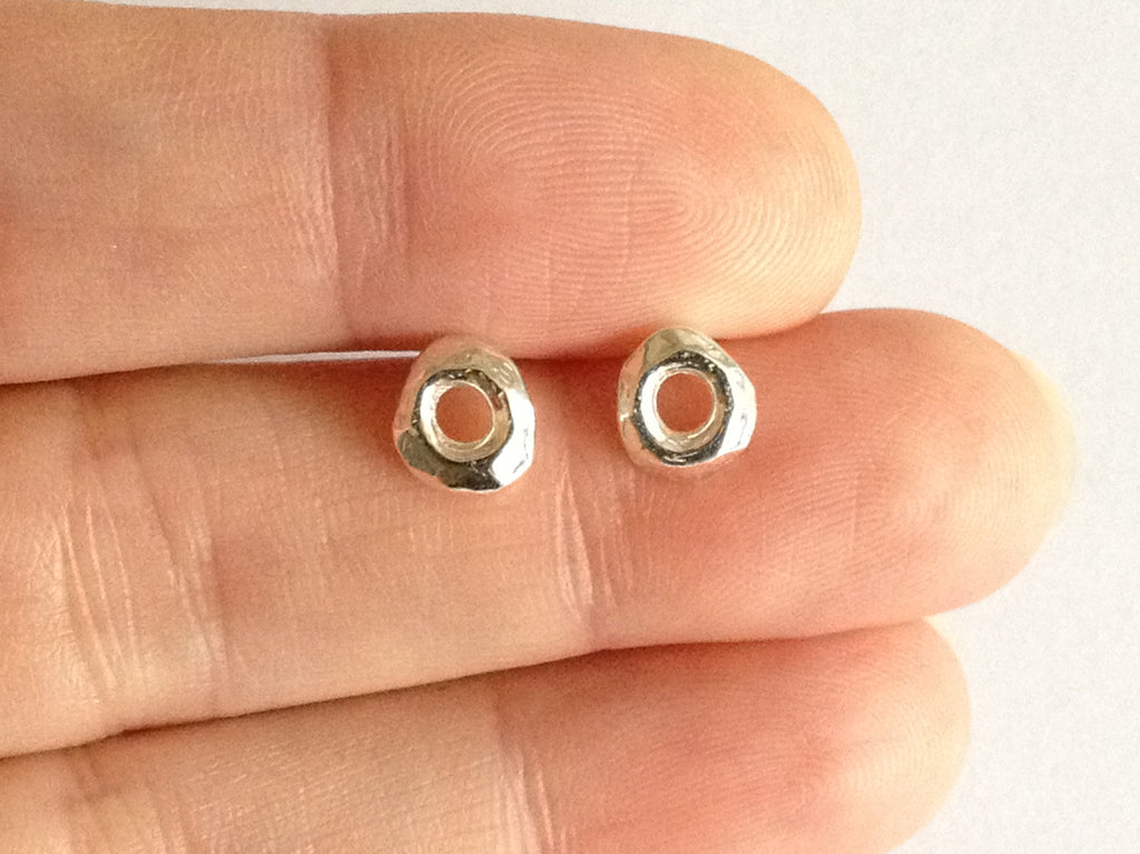 Tiny Silver Circle Stud Earrings by Fiona DeMarco