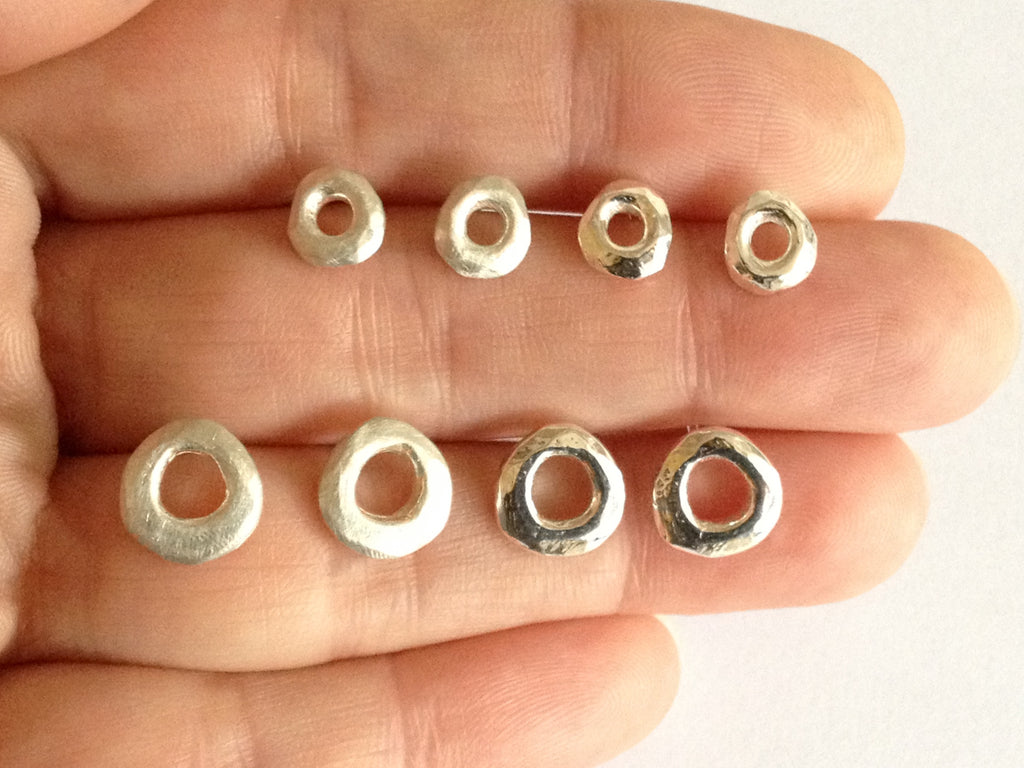 Tiny Silver Circle Stud Earrings by Fiona DeMarco