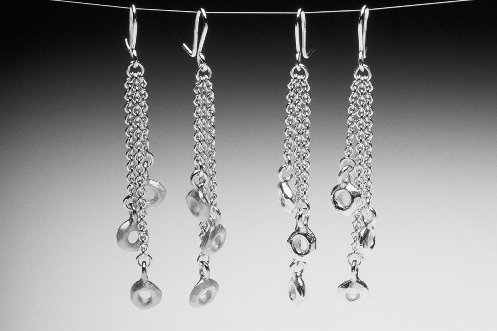 Long Silver Cascading Circle Drop Dangling Earrings by Fiona DeMarco