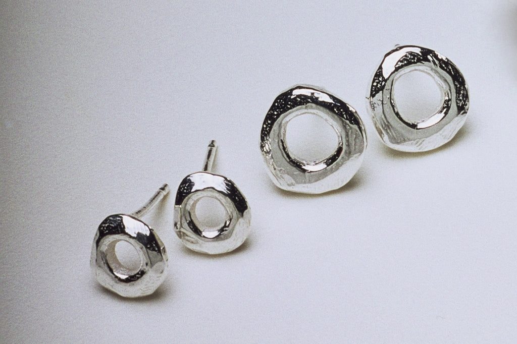 Tiny Silver Circle Stud Earrings by Fiona DeMarco