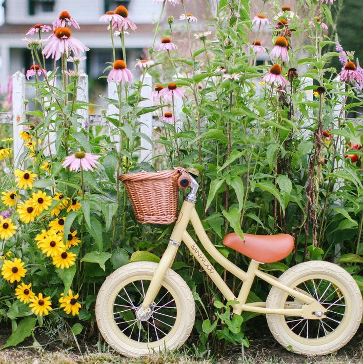 banwood balance bike. hipster balance bike. yellow banwod bike