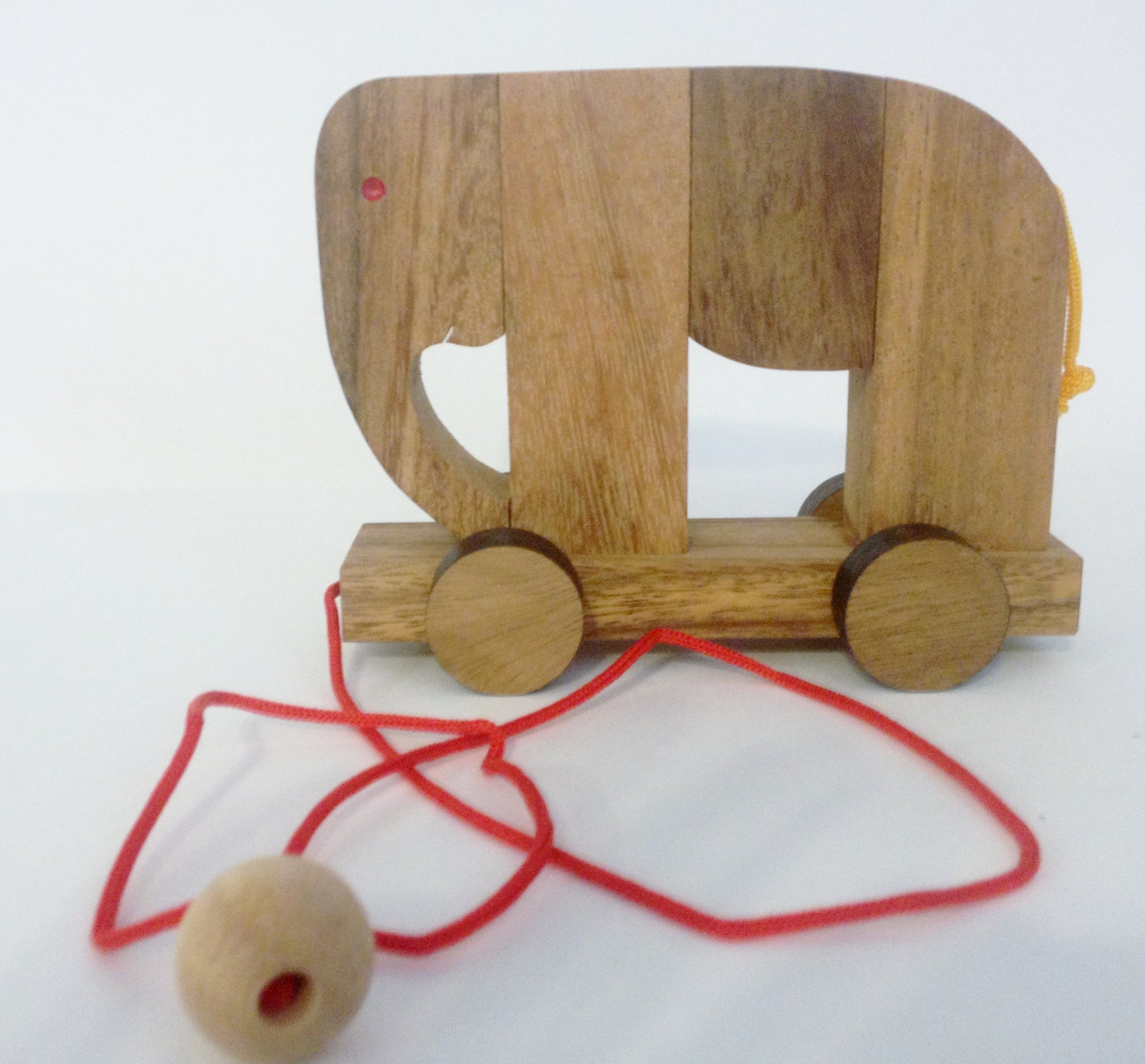 Play with this handcrafted wooden elephant, you can separate each 