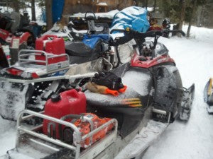 Sleds loaded to clear trails