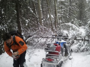 Starting the Chainsaw to clear the trail