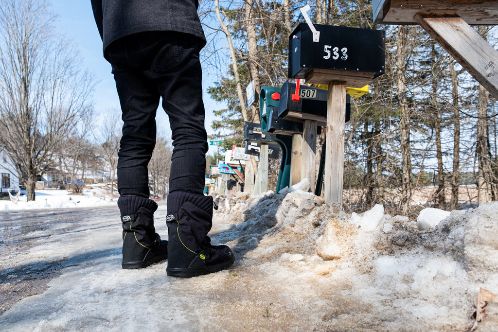pick up the mail in winter mailbox NEOS overshoes