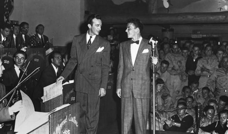 Frank Sinatra, right, performing with Harry James