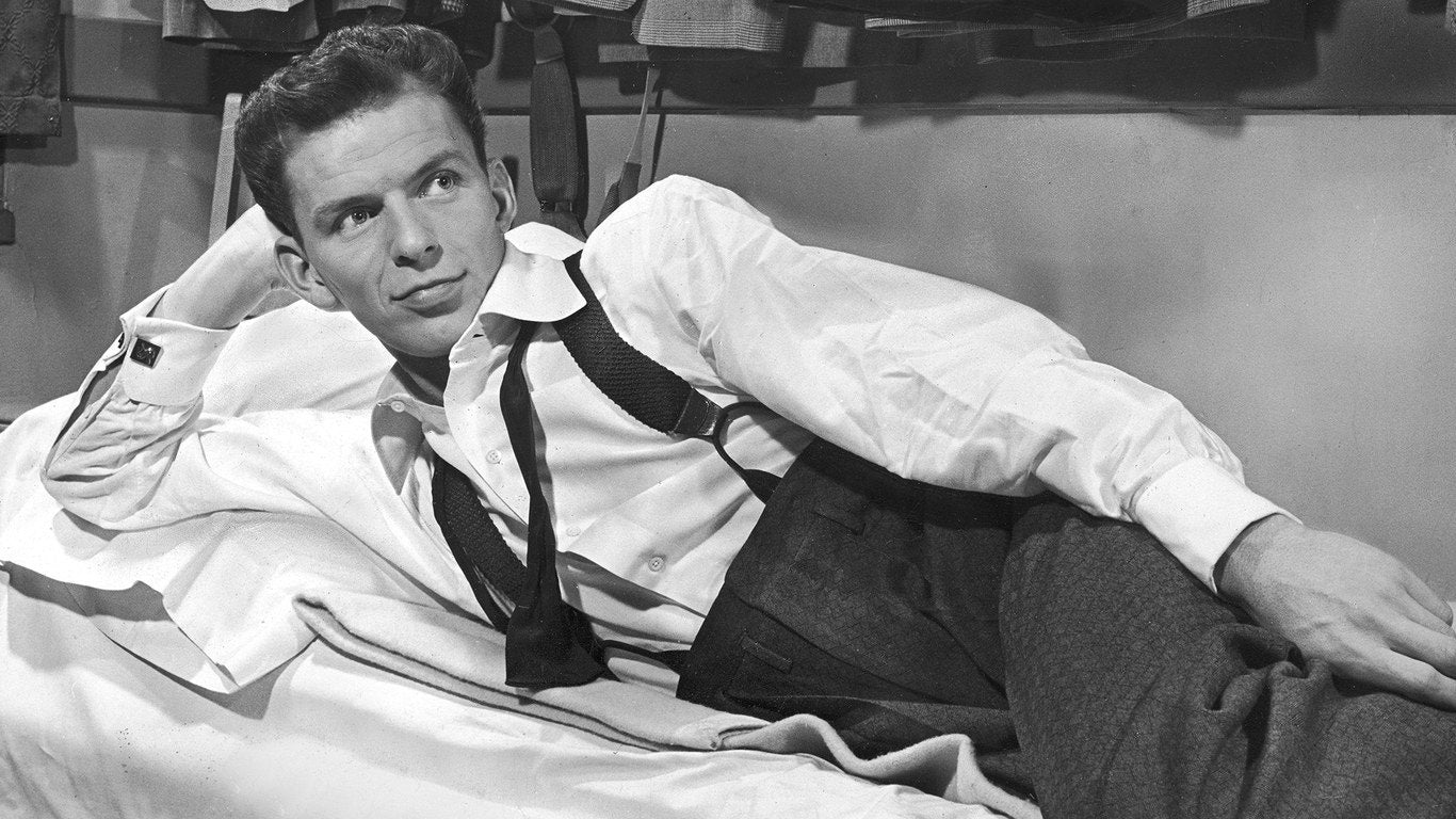 Frank Sinatra, with dark grey barleycorn patterned high waist pants