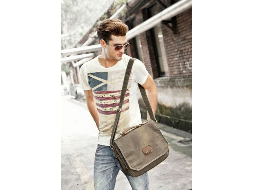 stylish guy wearing a distressed messenger bag by Serbags