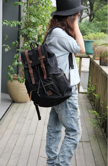 Casual Black Canvas Backpack with Adjustable Shoulder Straps for Work, School & Travel