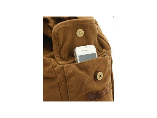 Side pocket details for brown canvas and leather rucksack