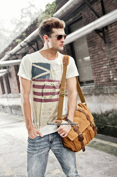 stylish mean sporting brown canvas military style messenger bag