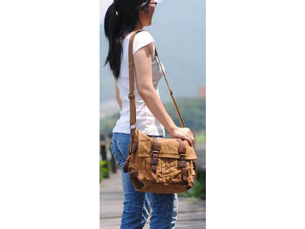 girl wearing unisex brown canvas military style messenger bag