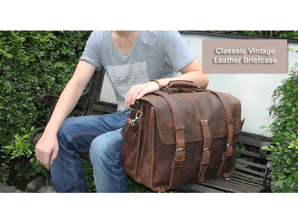 Man sitting next to his Selvaggio handmade leather briefcase & backpack