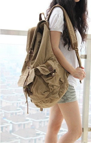 Side view of the light brown canvas classic backpack by Serbags