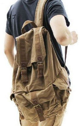 Man wearing the Serbags Classic Canvas Rucksack Backpack