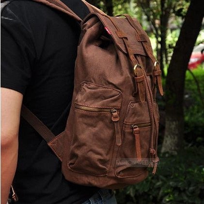 Boy wearing the Serbags sturdy dark brown vintage hiking backpack