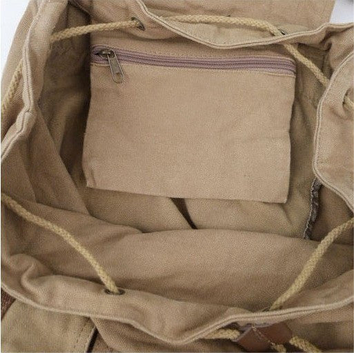 Interior lining of the Woman sporting the light-brown Classic Canvas Rucksack Backpack by Serbags