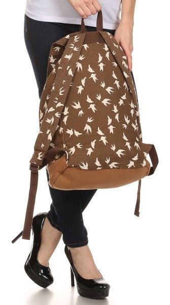 woman carrying brown dove art print school rucksack by Serbags