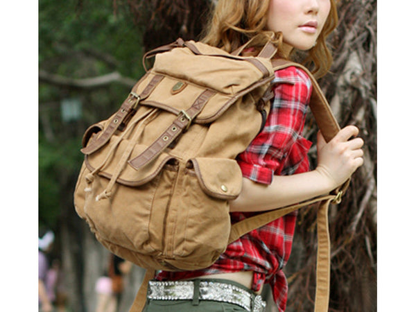 Woman wearing light brown canvas rucksack backpack by SerBags
