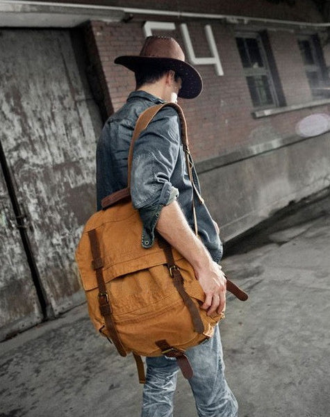 Fashionable guy sporting the brown Serbags canvas travel backpack 