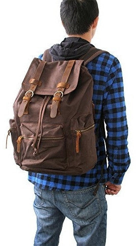 guy sporting the beautiful dark brown vintage canvas backpack by Serbags