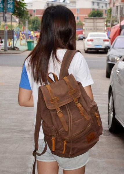 durable chocolate colored canvas backpack worn by girl