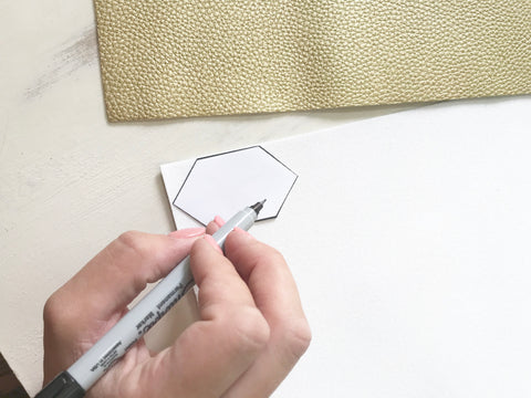 Tracing leather earring cutouts