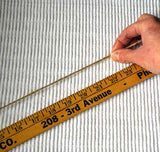 How to measure head size if you don't have a tape measure using a piece of twine or yarn.