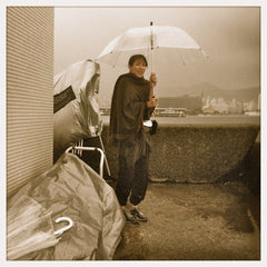 Filmmaker Jodi Smith's Khunu Mongolian Yak Wool Sweater shields her from the rain while filming on set.