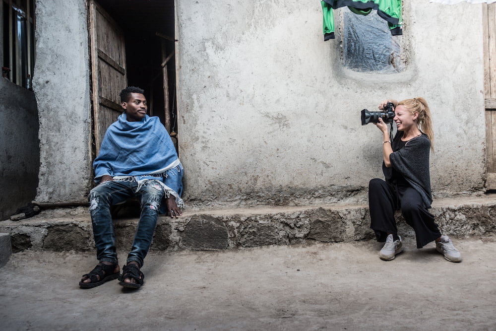 ethiopian being taken a photography by xiomara