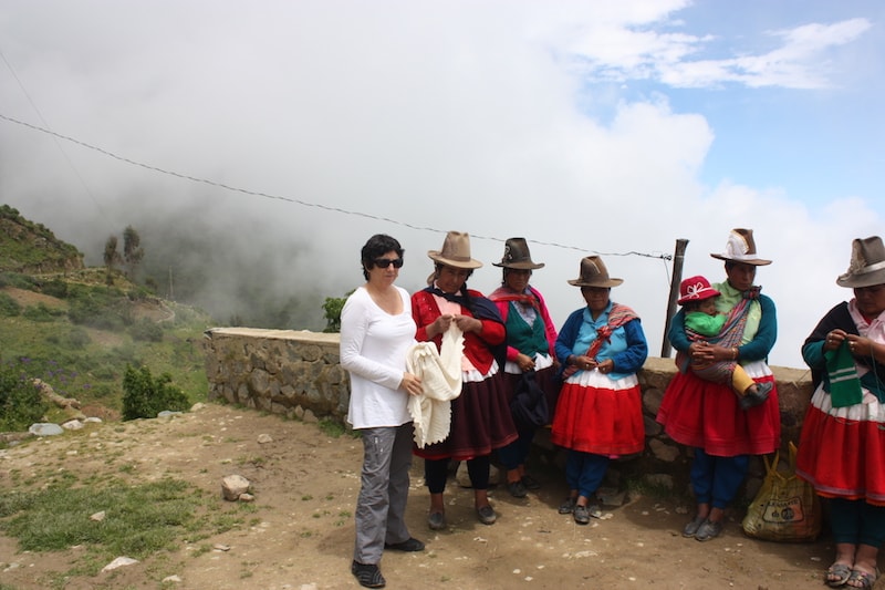 women artisans in traditional dresses