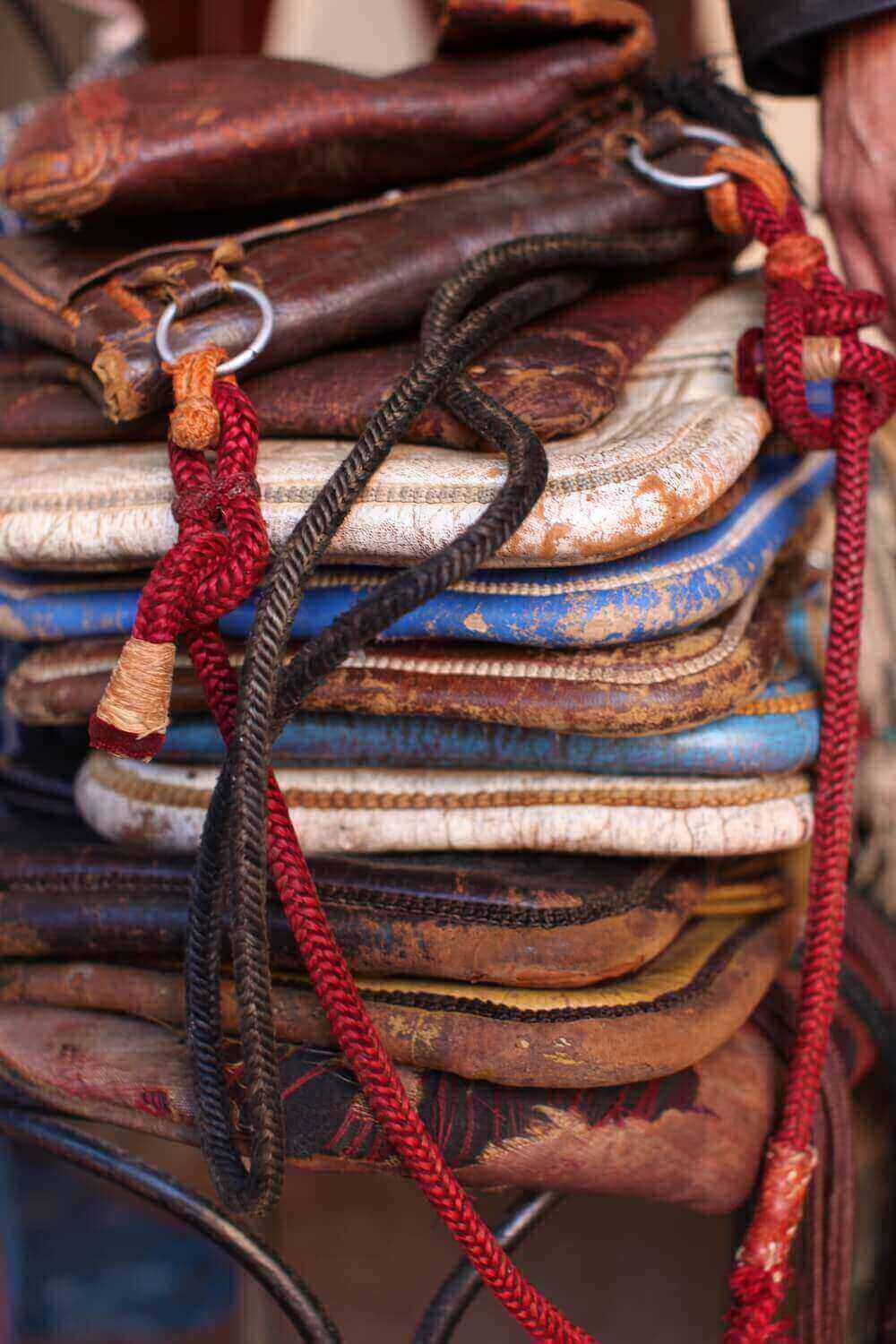 pile of old berber bags collected by andrea bury