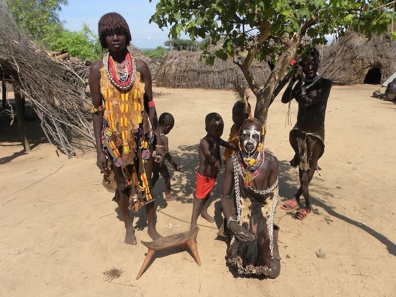 woman and children in traditional outfit in an ethopian tribe