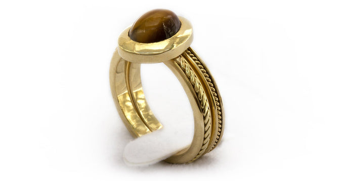 gold or silver Tiger-eye cabochon-cut stone filigree ring