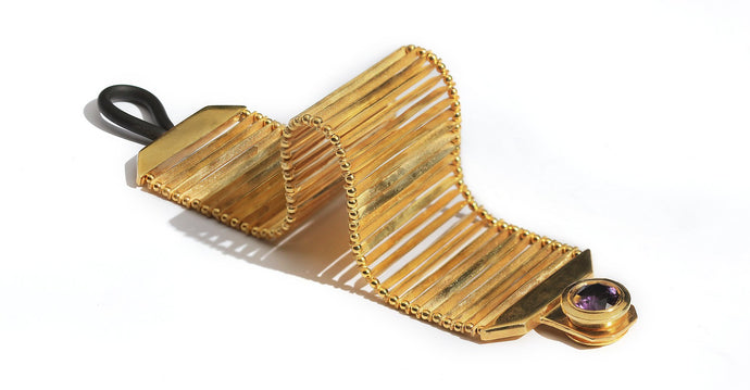 Flexi tach- design of gold bracelet for female
