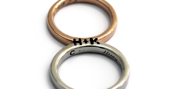rose gold and silver promise ring set engraved with initials