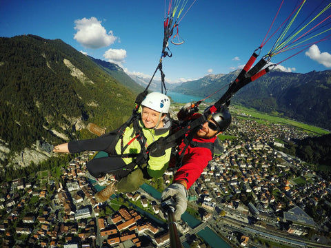 Lauren and Henry Costa paragliding in Switzerland