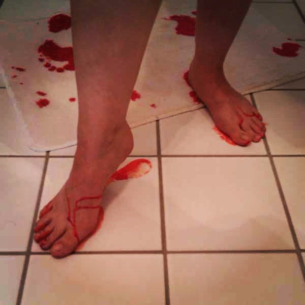 Bloody Footprints Bath Mat