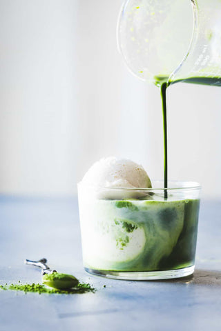 Matcha and ginger affogato on vanilla ice cream.