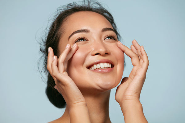 woman smiling with healthy skin