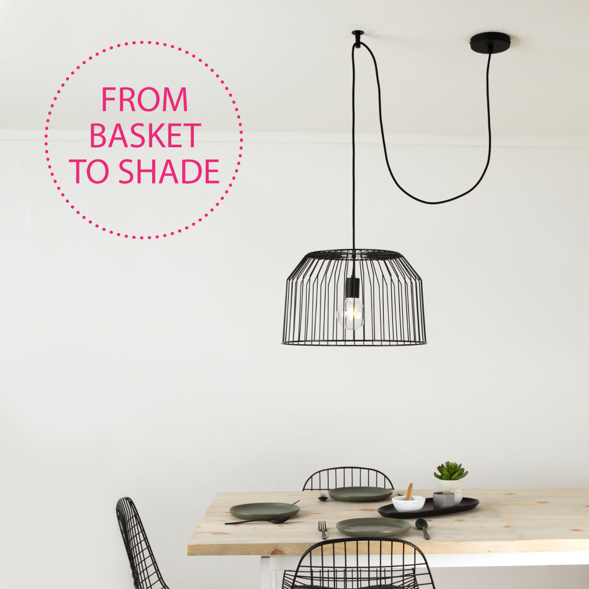 Black pendant light with wire basket shade image