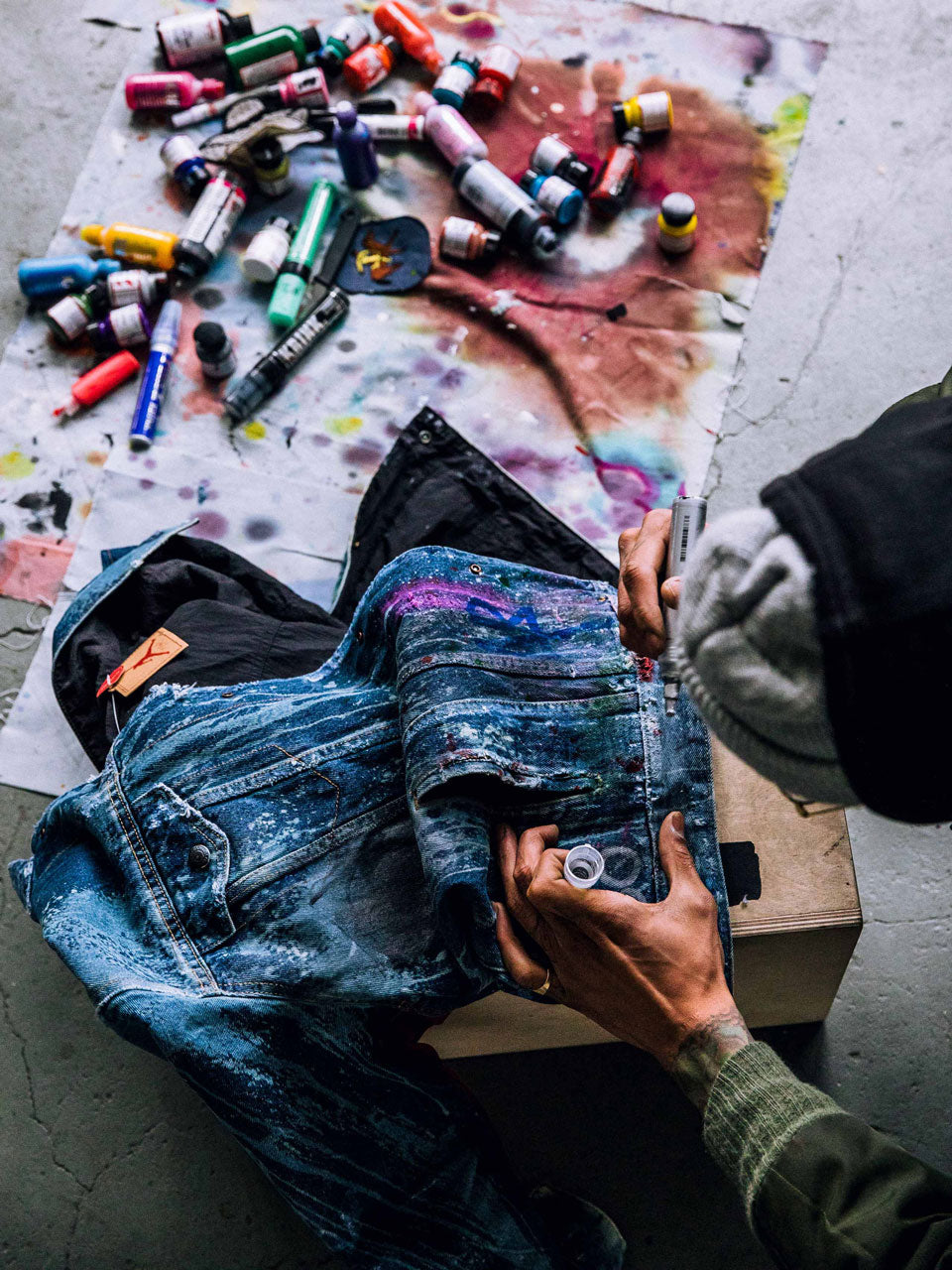 Julian Gaines customizes with Krink in Jordan X Levi's collaboration
