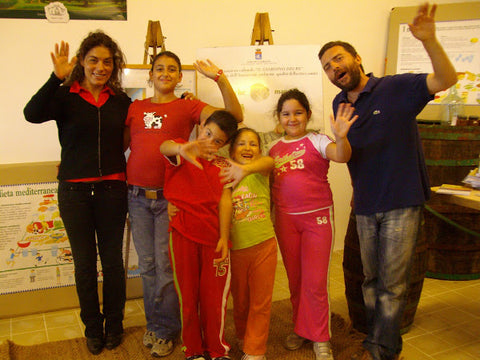Vito and Mila Perrini with local kids