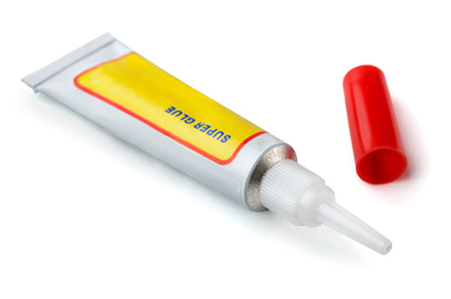 metal tube of superglue