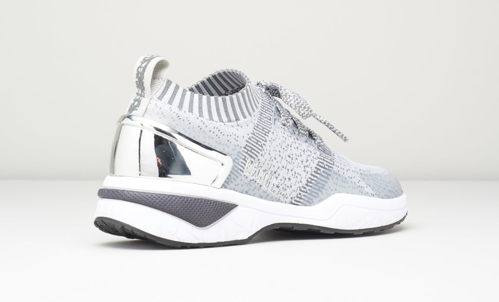 The back of an Alcyone dance sneaker in grey/silver