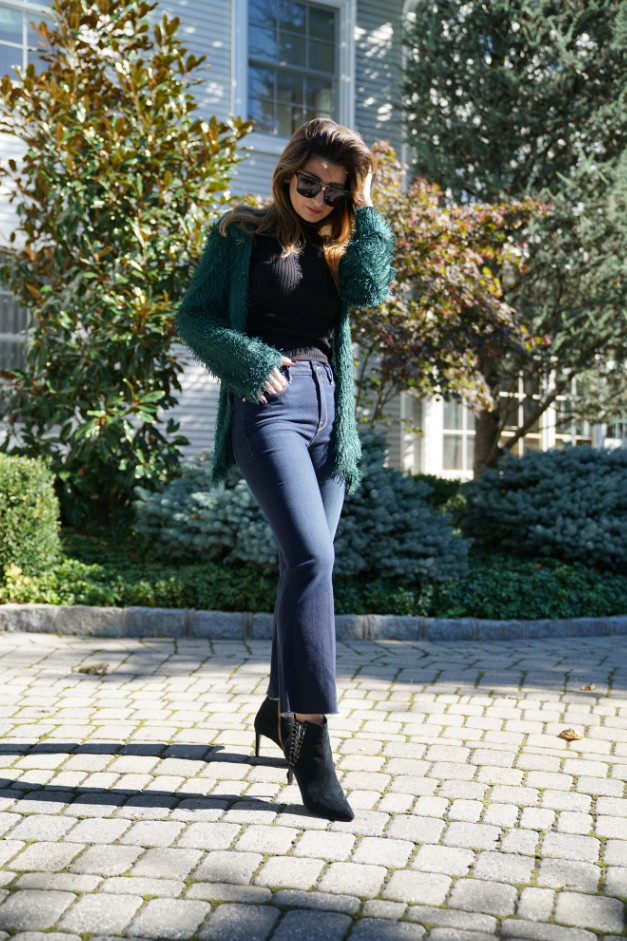 Margaux Minutolo wears Emerald Fringe Jacket by KARMA for a cure with Frame Denim from Neiman Marcus